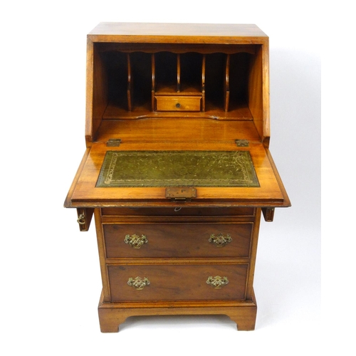 34 - Small yew wood bureau fitted with a fall above four drawers, 96cm high x 50cm wide x 40cm deep