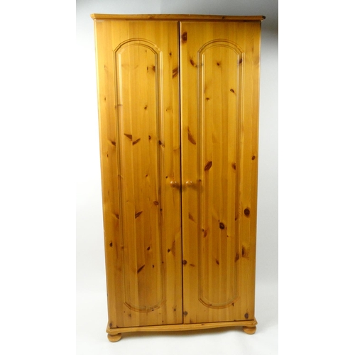 81 - Pine two door wardrobe, 178cm high x 88cm wide x 55cm deep