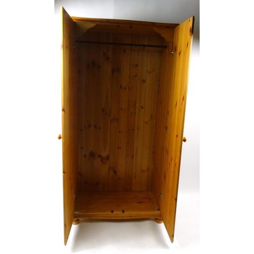 81 - Pine two door wardrobe, 178cm high x 88cm wide x 55cm deep