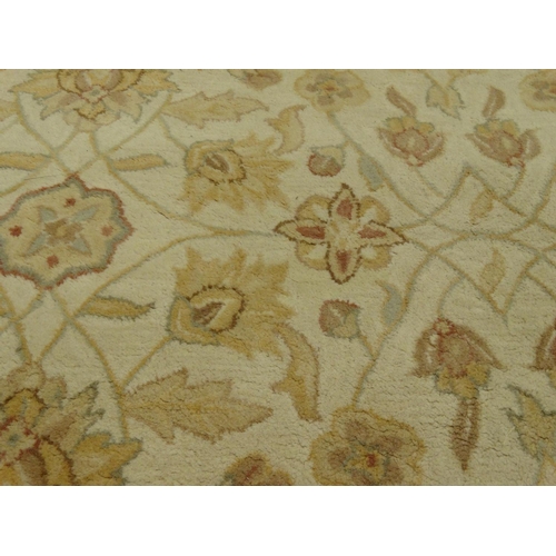 109 - Cream ground floral rug, approximately 190cm x 126cm