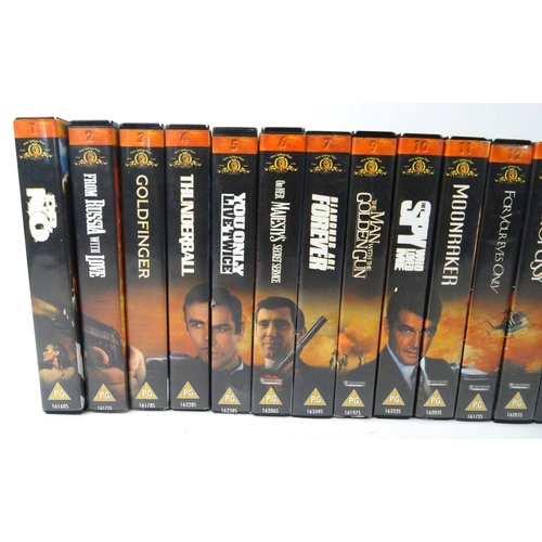 494 - Box of VHS cassettes including a set of James Bond