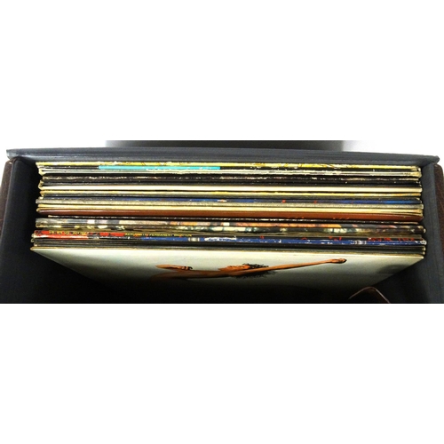 420 - Case of mostly rock LP records including Kiss, Queen etc.