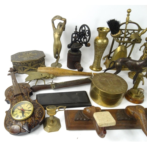 480 - Box of assorted wooden and brass items, including fire tools, candle sticks, violin clock, a carving... 