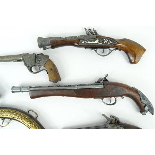 640 - Ten decorative flint lock pistols