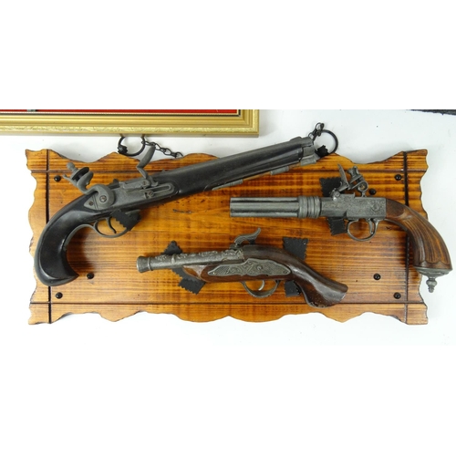 639 - Six decorative flint lock and revolver pistols