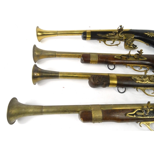 631 - Four decorative Blunderbuss guns, the larger 68cm long