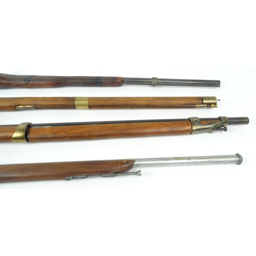 633 - Six decorative flint lock rifles, the larger approximately 112cm long