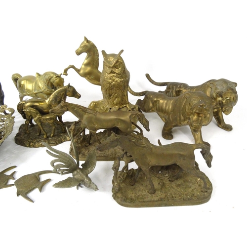 299 - Collection of brass animals including a pair of large tigers, horses etc.