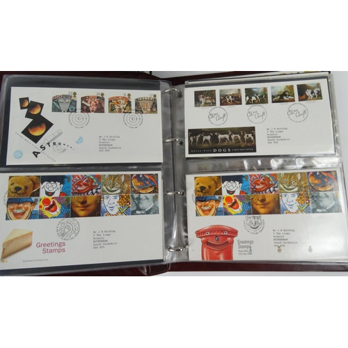 584 - Extensive collection of first day covers and stamp wallets, housed in two suitcases