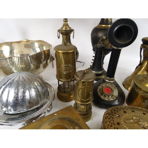 521 - Two boxes of metal ware, including brass caskets, miners lamps, silver plated items, claret jugs, a ... 