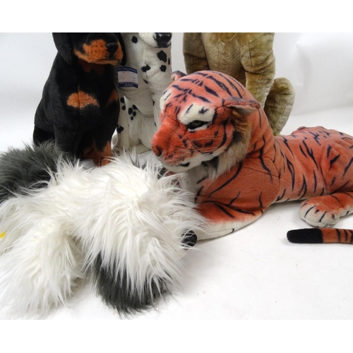 350 - Four large soft toy dogs and a tiger, the largest approximately 120cm high