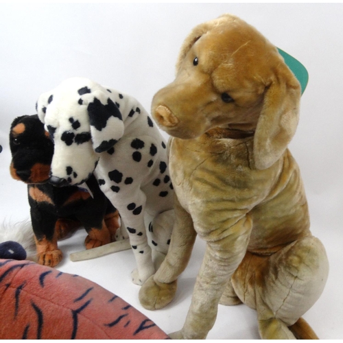 350 - Four large soft toy dogs and a tiger, the largest approximately 120cm high