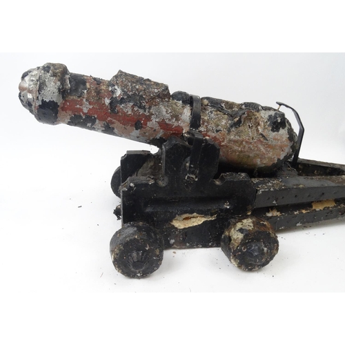 199 - Garden stone ware model cannon, 88cm long