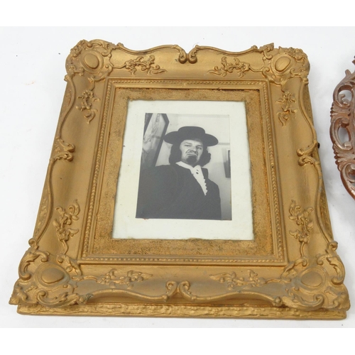 467 - Two ornate picture frames, the larger 66cm x 57cm