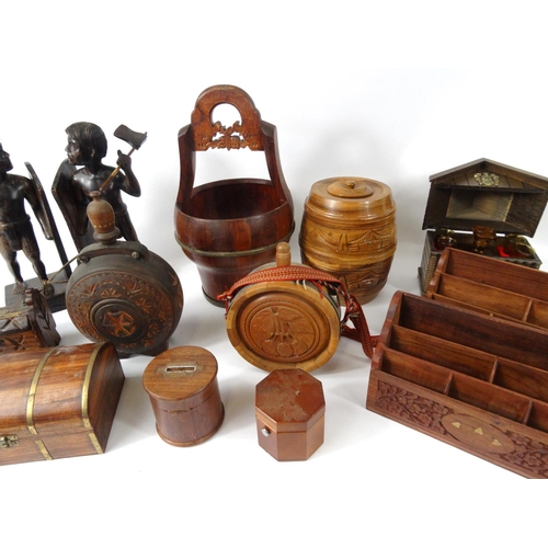 512 - Box of wooden items including flasks, barrel, letter racks, figural book ends etc.