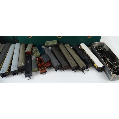 287 - Four boxes of model railway, carriages, track, trackside buildings etc. including Hornby examples