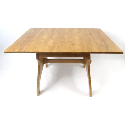 110 - Square pine drop leaf dining table, 75cm high x 73cm (folded) x 75cm deep