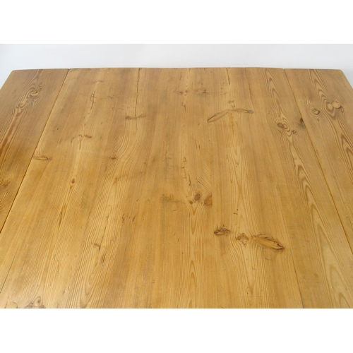 110 - Square pine drop leaf dining table, 75cm high x 73cm (folded) x 75cm deep