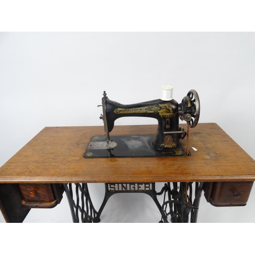 146 - Vintage Singer sewing machine table with some accessories