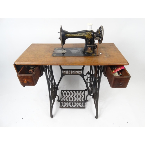 146 - Vintage Singer sewing machine table with some accessories