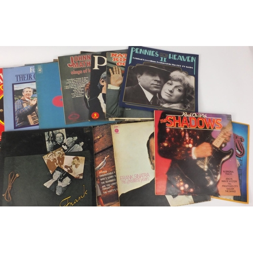 424 - Small selection of LP records including Johnny Cash, The Shadows, Frank Sinatra etc.