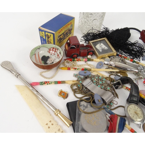 411 - Bag of objects including Corgi die cast Tom and Jerry vehicles, vintage Medex wristwatch, costume je... 