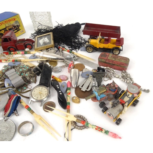 411 - Bag of objects including Corgi die cast Tom and Jerry vehicles, vintage Medex wristwatch, costume je... 