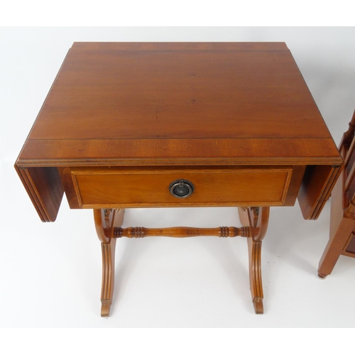 62 - Yew wood drop leaf occasional table with a frieze drawer and a yew wood magazine rack with a drawer ... 