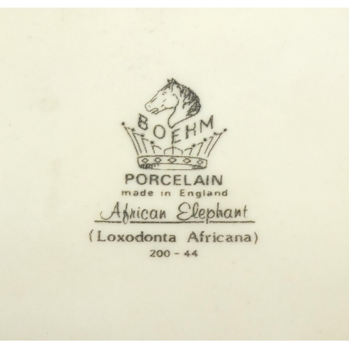 2116 - Boehm porcelain figure of an African Elephant, together with a Boeham porcelain figure of a duckling... 