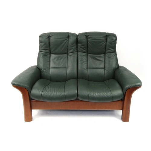 2026 - Ekormes green leather stressless two seater settee, 105cm high