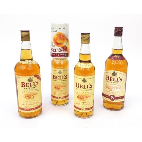 2207 - Four bottles of Bell's old Scotch whisky, including two 1lt bottles and two 70cl bottles