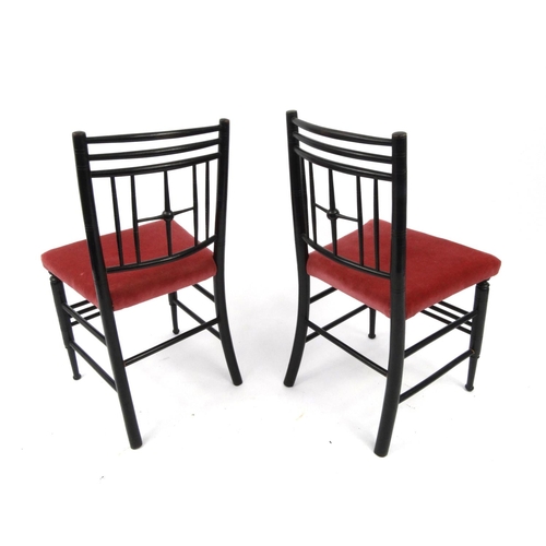 2015 - Pair of Liberty & Co Argyle ebonised chairs, with pink upholstered seats, each 84cm high