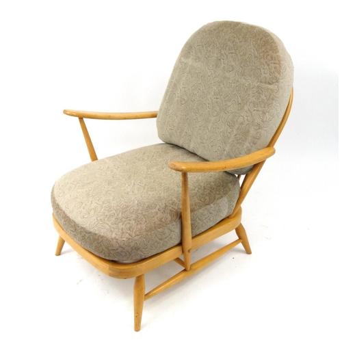 2056 - Ercol light elm stick back arm chair with floral upholstered cushions, 86cm high