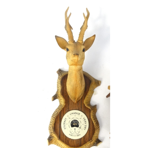 540 - Wooden cuckoo clock and two animal head barometers