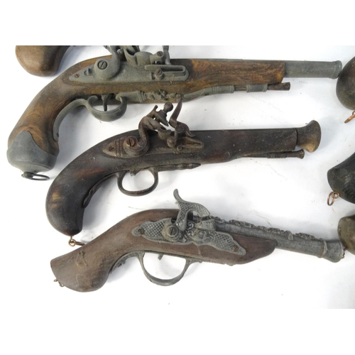 642 - Ten decorative flint lock pistols