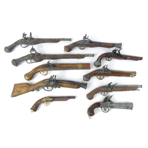 641 - Ten decorative flint lock pistols