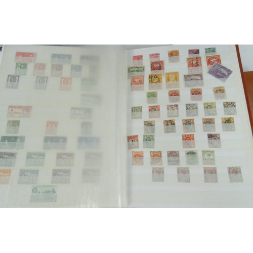 586 - Extensive collection of British and World stamps, arranged in albums, Two Stanley Gibbons empty stoc... 