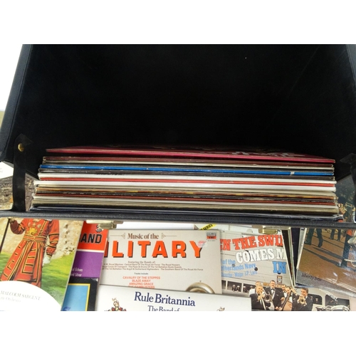 426 - Case of mostly military brass band LP records and a small selection of 45RPM records