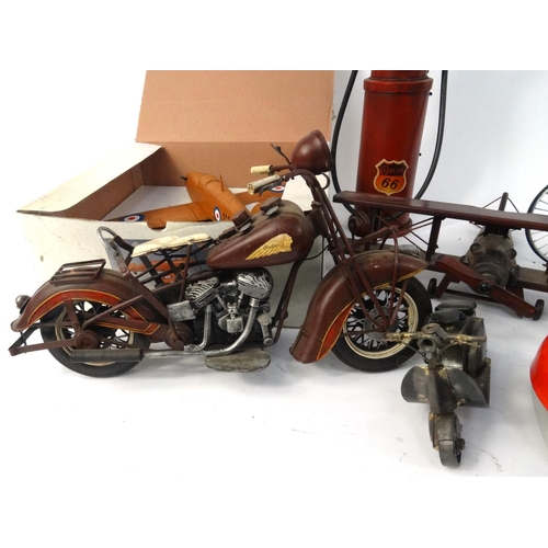 477 - Box of items, including wooden model planes, decorative tin petrol pump clock, model motorbikes etc