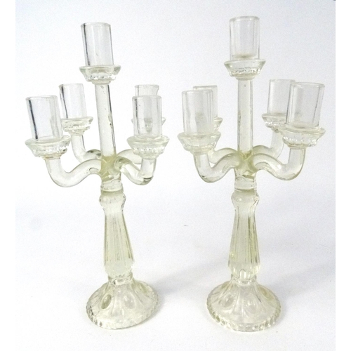 546 - Pair of pressed glass five branch candelabras, 41cm high