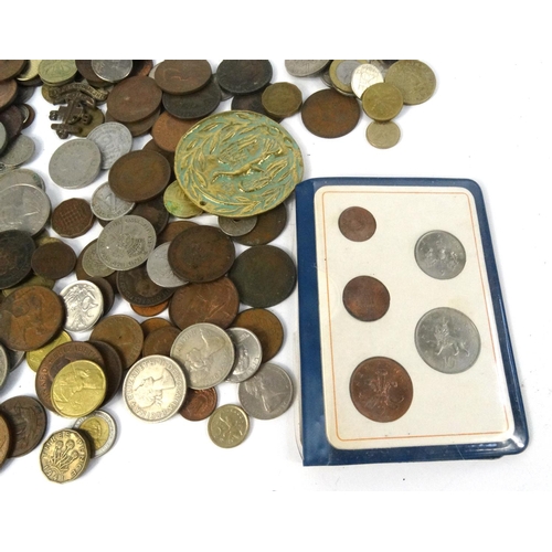 415 - Tin of mostly British pre decimal coins, including 1853 penny, commemorative medallions, enamelled s... 