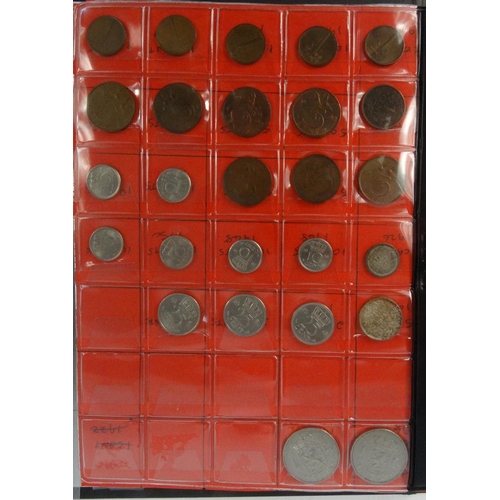 416 - Two albums of world coins, including Maundy coins, pennies, half pennies, francs etc.