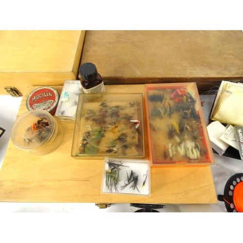 471 - Collection of fly fishing tackle, including flies and reels and three float boxes