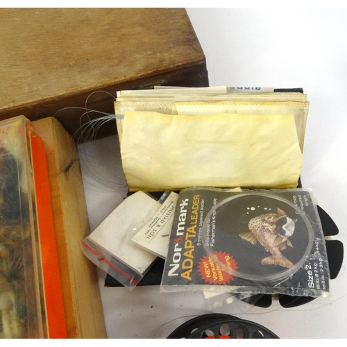 471 - Collection of fly fishing tackle, including flies and reels and three float boxes