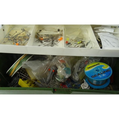 472 - Two boxes of sea fishing tackle, including hooks, rigs lead weights etc.