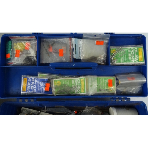 472 - Two boxes of sea fishing tackle, including hooks, rigs lead weights etc.