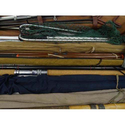 470 - Selection of fresh water and sea fishing rods, a set of waders, tackle box etc.