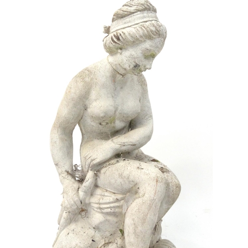 195 - Two stoneware garden nude figurines, the larger 56cm high