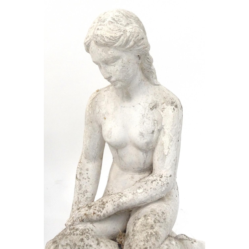 195 - Two stoneware garden nude figurines, the larger 56cm high