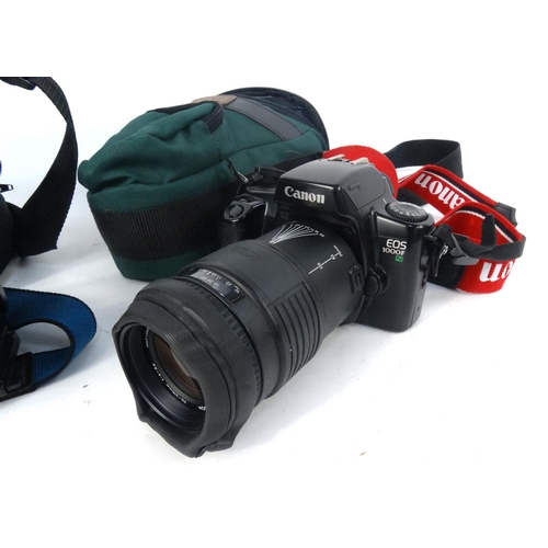 437 - Canon EOS 1000F camera and a Samsung video camera